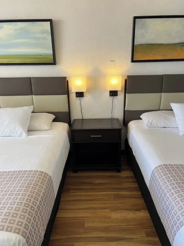 Standard Quadruple room with garden view