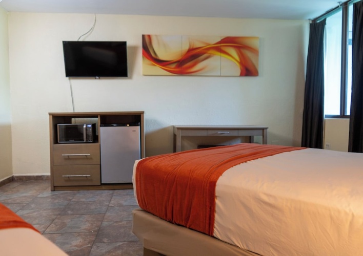 Deluxe Quadruple room with balcony and with ocean view