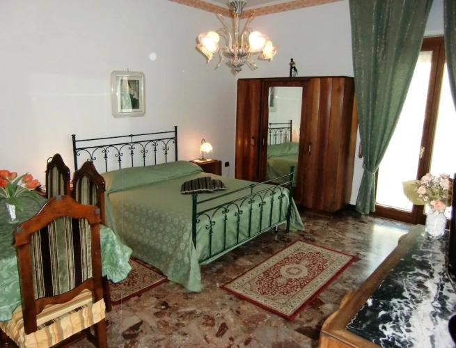Standard Quadruple room with balcony and with garden view