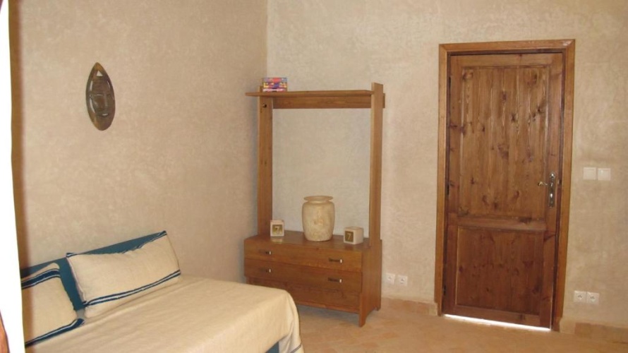 Standard Triple room with garden view