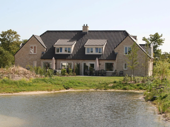 Spacious villa with dishwasher and deco fireplace on Texel