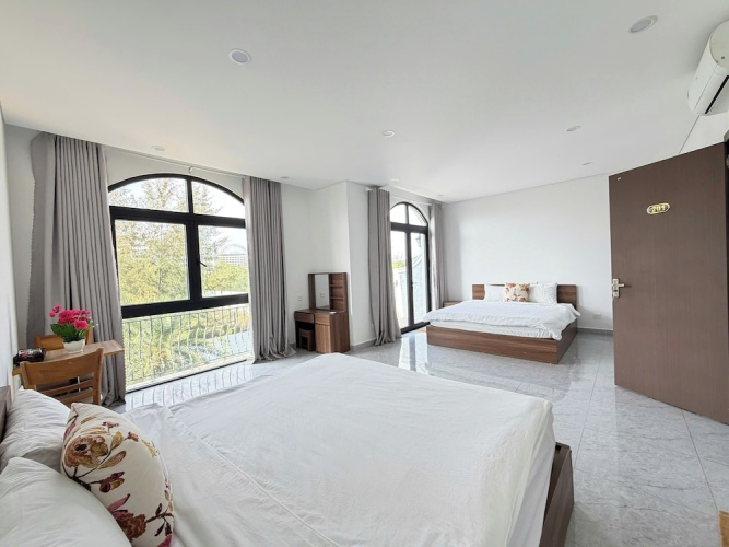 Deluxe Quadruple room with balcony and with city view