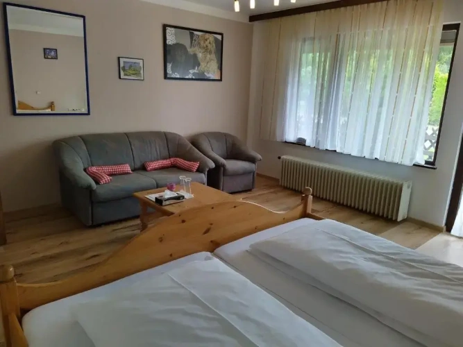 Standard Triple room with garden view