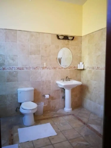 Standard Quadruple room with courtyard view