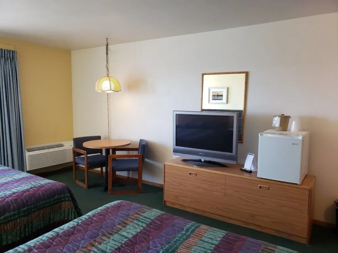 Deluxe Quadruple room with balcony