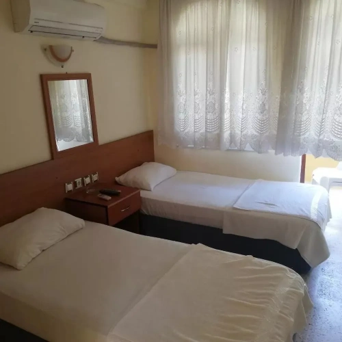 Standard Quadruple room with balcony and with garden view