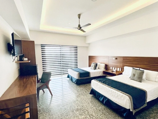 Deluxe Quadruple room with balcony