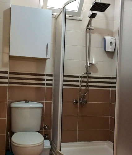 Standard Triple room with partial sea view