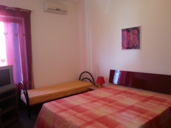 Standard Triple room with balcony and with garden view