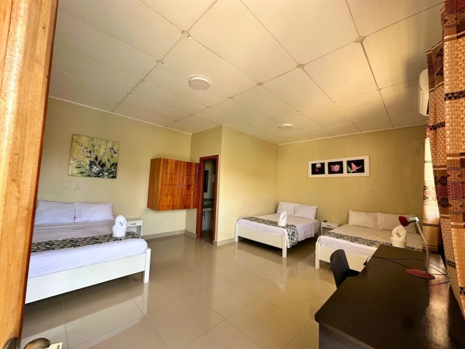 Standard Triple room with garden view