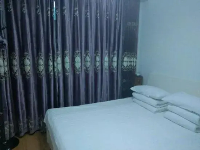 Benxi Huamu Hefu Warm Apartment