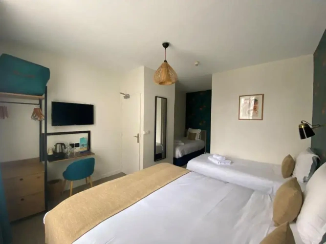 Standard Quadruple room with courtyard view