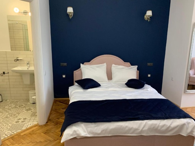 Standard Quadruple room with garden view