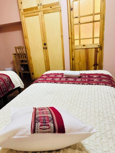 Standard Triple room with courtyard view