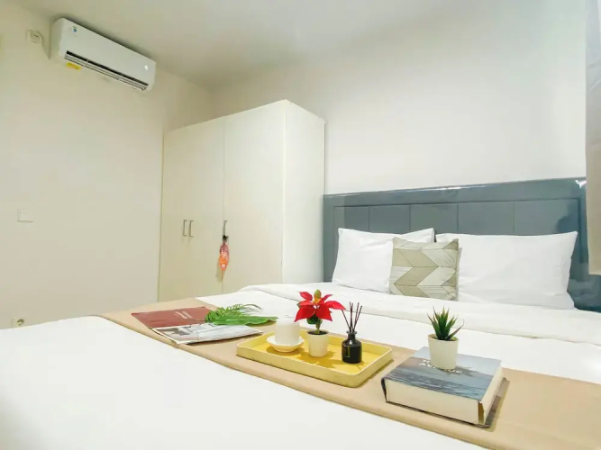 Simple 2Br At Azalea Suites Apartment