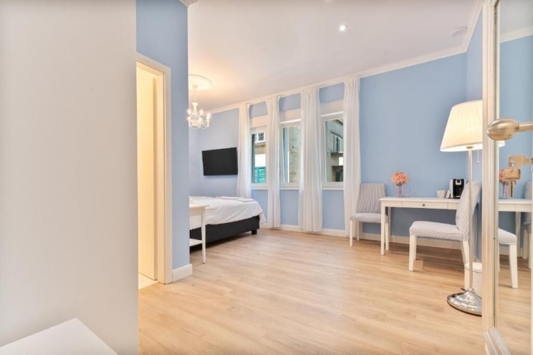 Comfort room with balcony and with street view