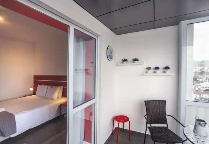 Deluxe Triple room with balcony and with ocean view