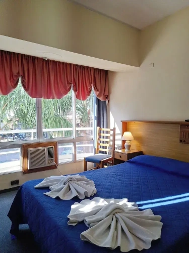 Standard Quadruple room with balcony and with city view