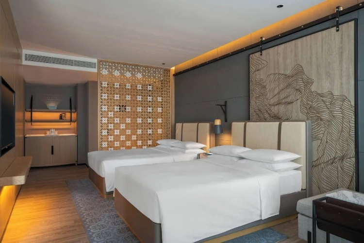 Deluxe Quadruple room with balcony and with garden view