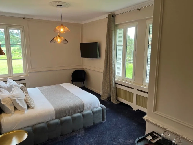 Deluxe Quadruple room with park view