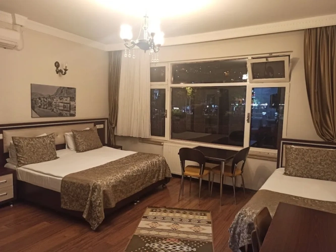 Standard Triple room with river view