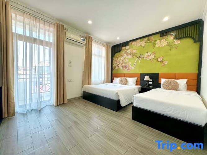 Deluxe Triple room with balcony
