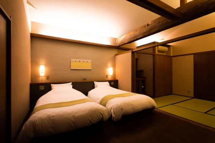 Standard Quadruple room with balcony and with garden view