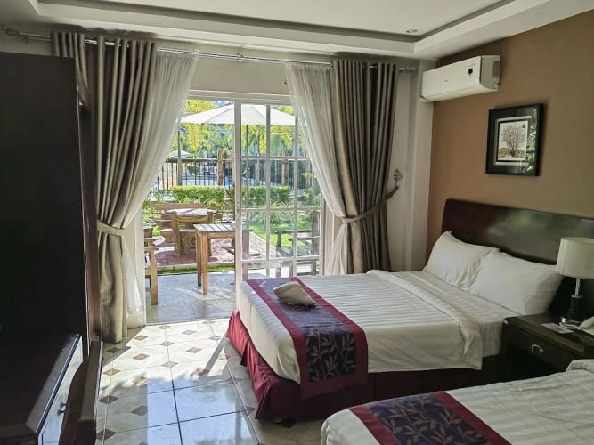 Deluxe Twin room with balcony and with pool view