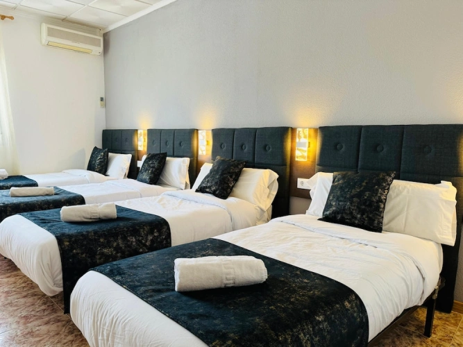 Standard Quadruple room with courtyard view