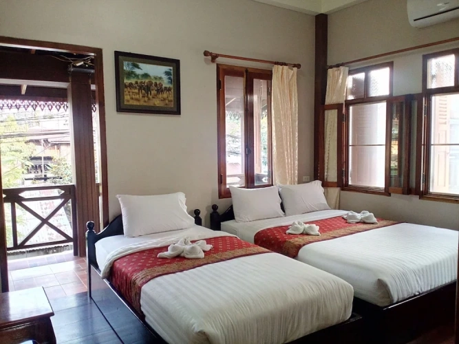 Superior Triple room with balcony and with city view