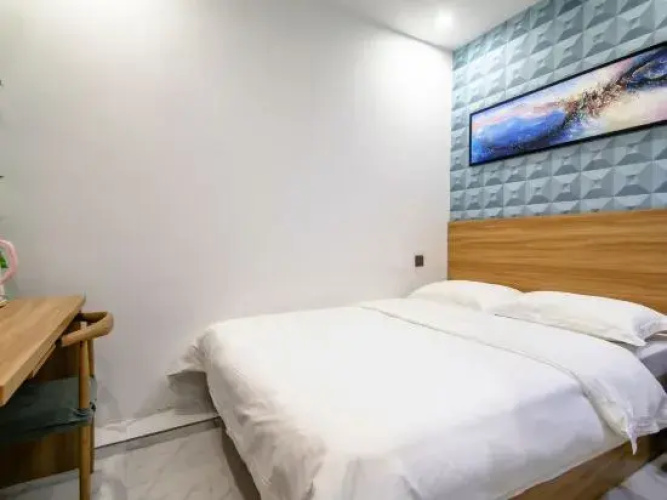 Daqing Boger Hotel (Xinmate Store)