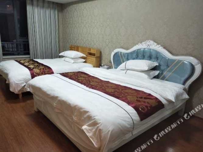 Deluxe Quadruple Family Suite
