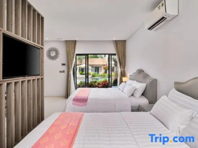 Deluxe Twin Family room with garden view