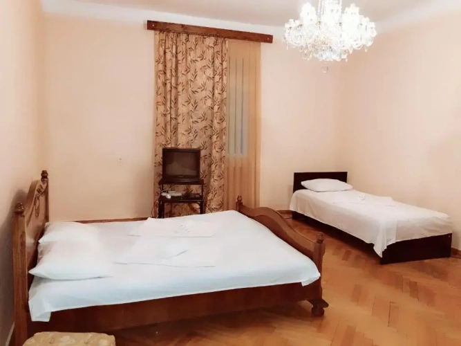 Standard Quadruple room with garden view