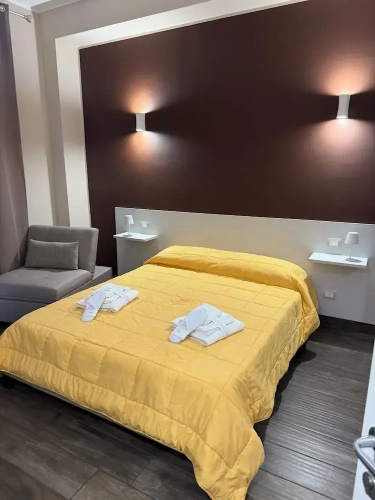 Standard Triple room with balcony and with partial sea view