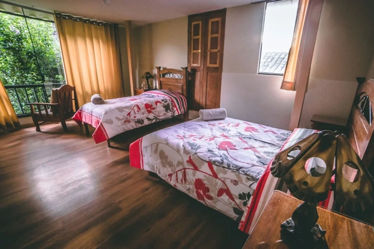 Standard Triple room with balcony and with garden view