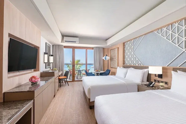Family room with Beach view