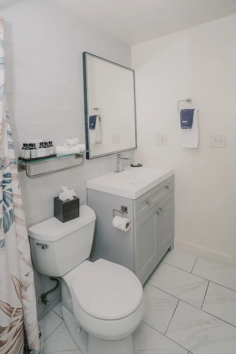 Deluxe Quadruple room with partial ocean view