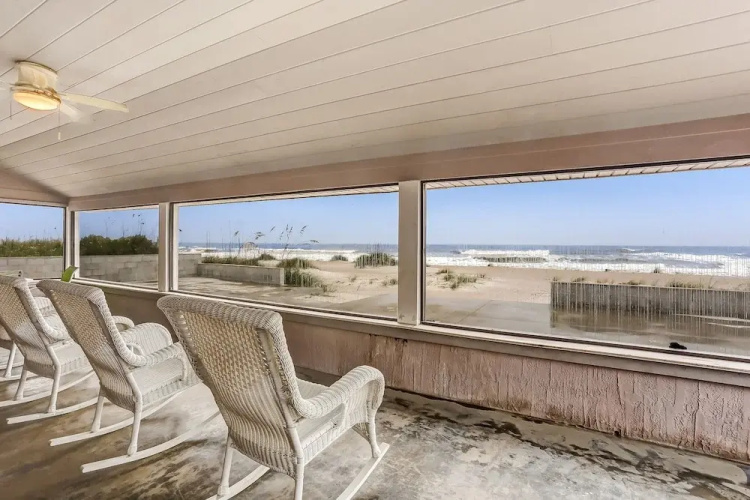 Charming Oceanfront Beach House by RedAwning