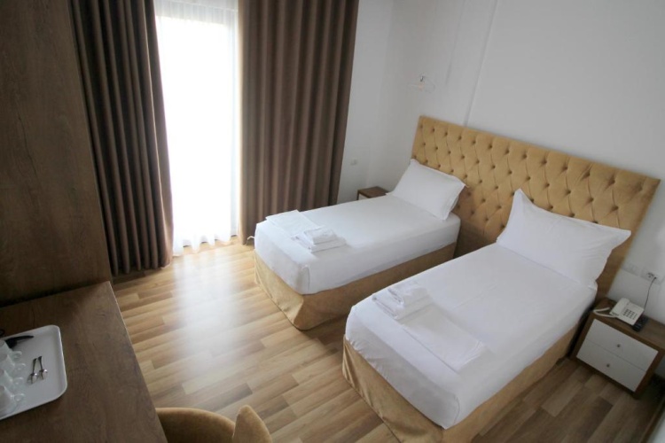 Deluxe Quadruple room with balcony