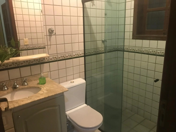Casa 5 suítes com piscina e churrasqueira