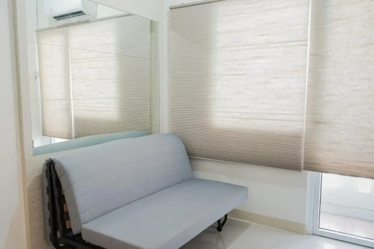 2BR Apartment with Sofa Bed at Green Pramuka City