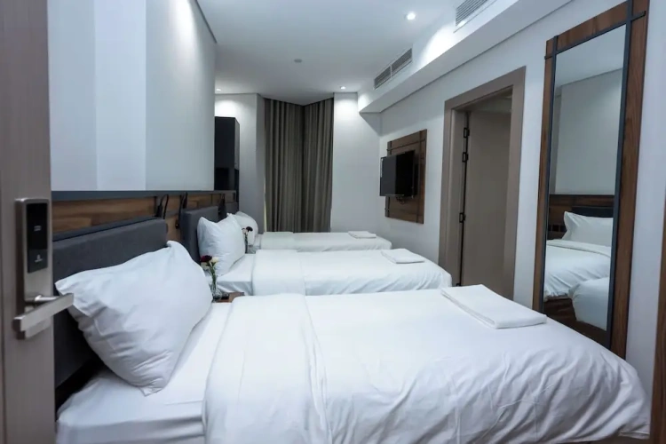 Deluxe Quadruple room with balcony