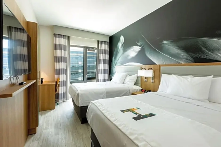 Deluxe Quadruple room with balcony
