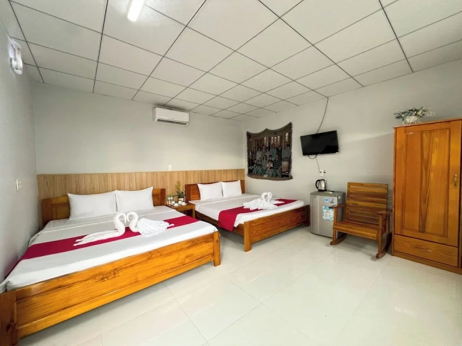 Executive Quadruple room with garden view