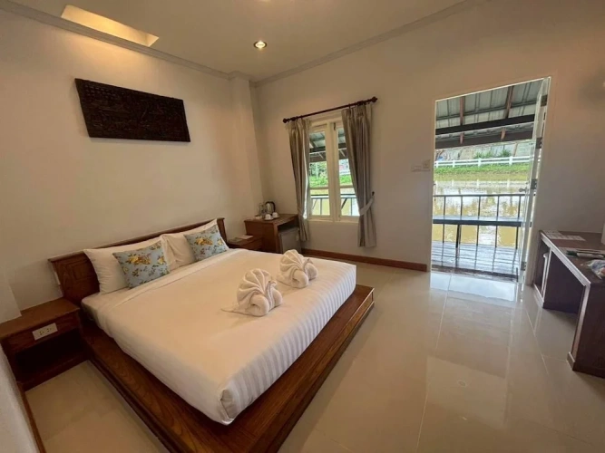 Cottage with balcony and with water view