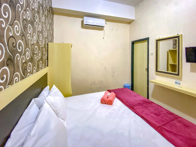 Tini's Guest House Malang RedPartner