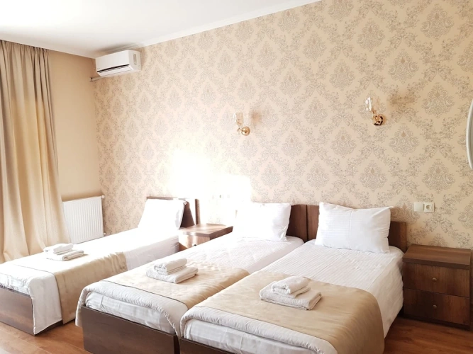 Standard Triple room with balcony