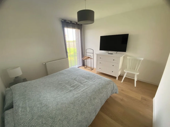Standard Quadruple Family room with garden view