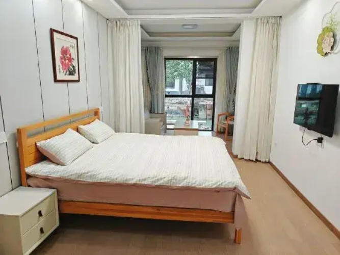 Tongli Flower Hotel(同里那年花开客栈)